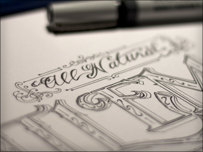 All Natural E black and white illustration inked lettering