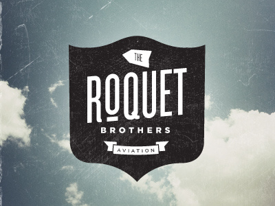 Roquet Bros brand logo nil santana shields typography
