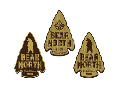 Bear North arrow arrowhead badge bear branding compass icon lettering lodge logo north