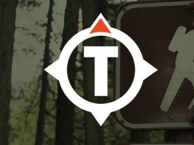 Trailspotter compass green hiking lettermark logo orange outdoors