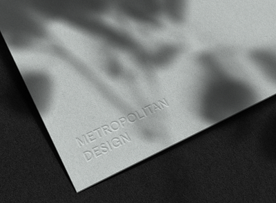 Metropolitan Design brand identity branding clean design emboss embossed illustrator logo logo design minimal monochrome photoshop typography