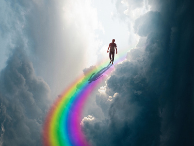 A dream. clouds lights man rainbow sky