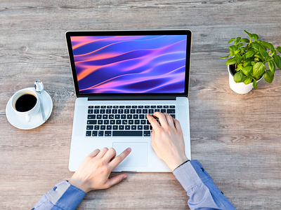 Person's Hand on Laptop Mockups - Mac Mockup