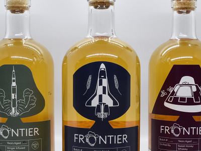 Frontier Whiskey bottle design branding logo packaging design