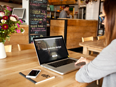 Working on MacBook Pro - 8 photo mockups cafeteria desk scene header image macbook mockup macbook pro mockup photo mockup psd web design wood workplace workspace