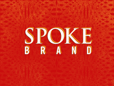 Spoke Brand trade gothic bold condensed trajan bold wicked worn