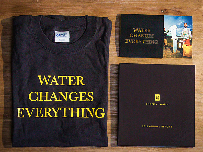 Package of Charity: Water Annual Report annual report charity: water design donation card package pop up print t shirts