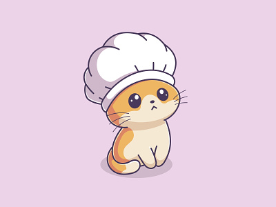 Cute kitten wearing a chef hat