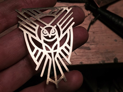 Arawak Head Badge badge bicycle logo mark metal owl