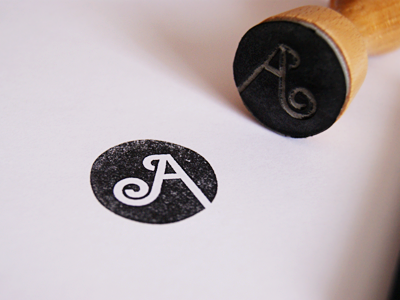 A Stamp awesome black circle ink logo rounded stamp