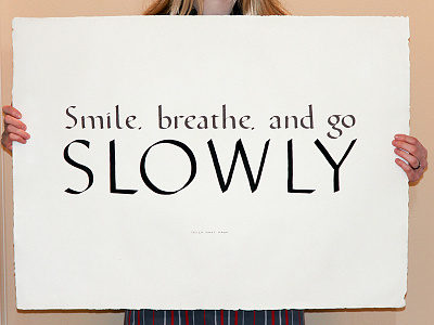 Smile, breathe and go slowly calligraphy