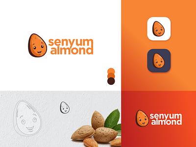 Senyum Almond Logo Design almonds branding design food logo design foodie identity identity branding illustration indonesia designer logo logo design mascot mascot character mascot design mascot logo minimal minimalist logo negative space logo orange logo