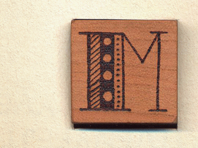 alphabet block M (animated) alphabet block illustration m type wood block wood burn