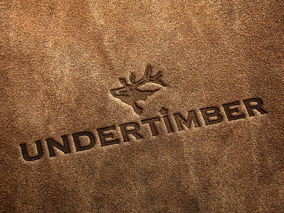 Undertimber logo on leather animal logo bear bear illustration bear logo branding forest illustration leather minimal mockup modern nature