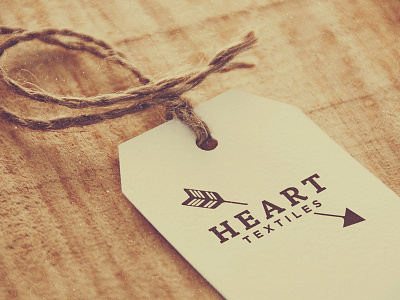 Heart Textiles -- Label Treatment arrows branding heart hearts identity logo