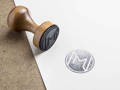 NOM Stamp.Invert logo mark