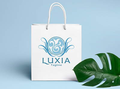 Luxia - Feminine Logo beauty logo beauty product boutique logo brand design branding cosmetic elegant feminine logo flourishes label logo design luxury brand luxury logo ornament