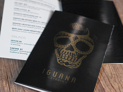 Iguana Catering Menu gold ink illustration skull