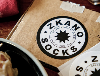 Final Sticker for Zkano branding collateral details label marketing packaging photo sticker swag