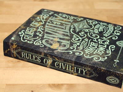 Rules of Civility amor towles book book jacket foil gold hand drawn hand lettering metallic mockup novel rules of civility swashes