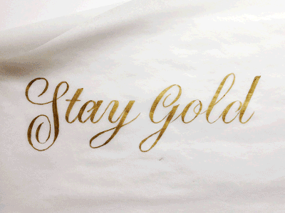 Stay Gold gold lettering script typography