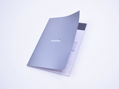 Munchkin Product Manual branding illustrations layout manual metallic ink offset print