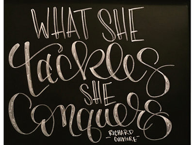 What She Tackles, She Conquers chalkboard hand lettering