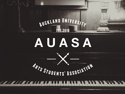 Full AUASA logo black brush crossed icon paint pencil piano white