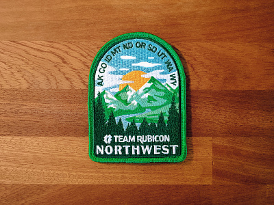 NW Territory Badge badge branding green illustration mountains northwest patch pine production sewn sun team rubicon trees