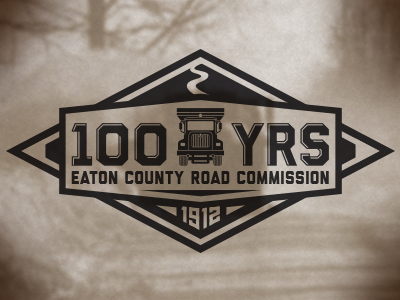 Road Commission Logo 100 1912 badge commission county date eaton logo michigan plow road truck years