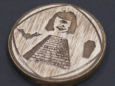 laser cut coins by Thomas Taylor on Dribbble