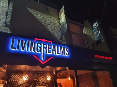 Living Realms store front branding logo store design