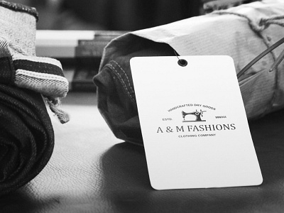 A&M Fashions brand branding clear clevery clothing company creative design drygoods elegant fashion identity label logo logotype manufacturing minimal stitching tailor vintage