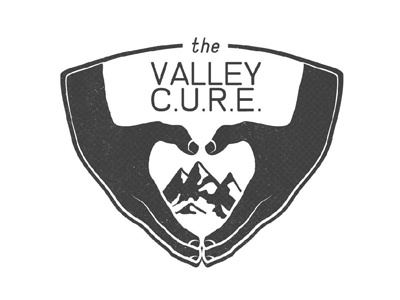 The Valley C.U.R.E. logo hands logo mountains