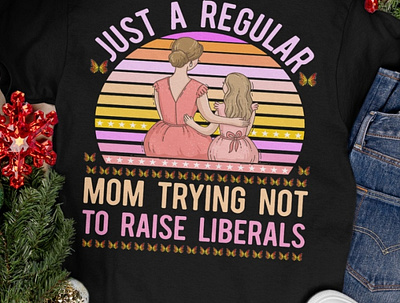 Just A Regular Mom Trying Not To Raise Liberals shirt baby beauty branding community logo family illustration logo love lovely mom mom t shirt mom t shirt mom t shirt design momlife mother typography