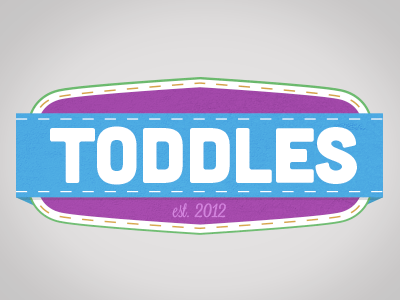 Toddles Logo Idea blue clothes kids label logo purple stitch tag