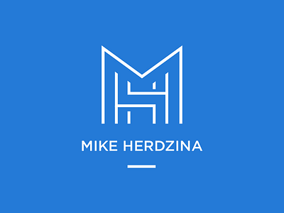 M.H. Logo