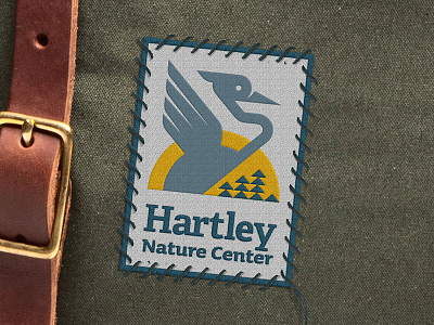 Hartley Nature Center Rebrand bird blue heron illustration logo nature sun trees