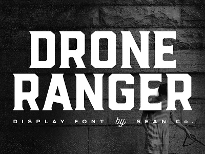 Drone Ranger Display Font chiseled decorative display font geometric inked oblique rough sans serif vintage