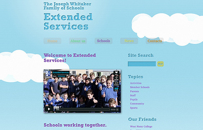 JWS Extended Services blue clouds colourful hills school site sky