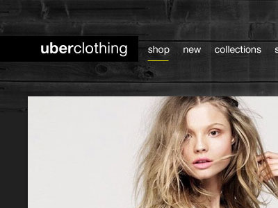 Uberclothing Homepage clean dark ecommerce minimal website