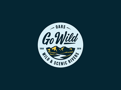 Go Wild badge branding illustration lettering mountains patch river script