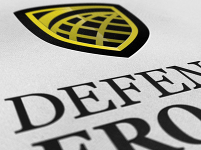 Defensearosols2 defence globe logo metal shield yellow