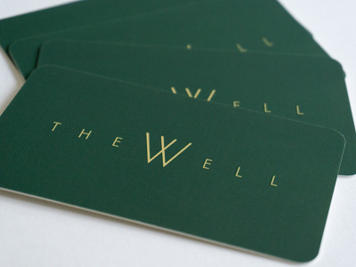 Business cards for The Well branding business cards logo