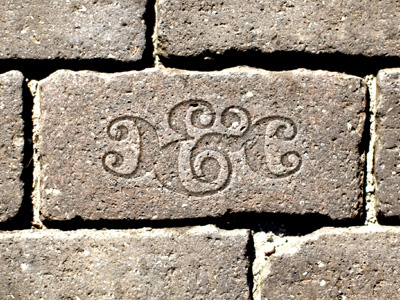 Courtyards & Cobblestone Brick antique brick cobblestones courtyards logo vintage