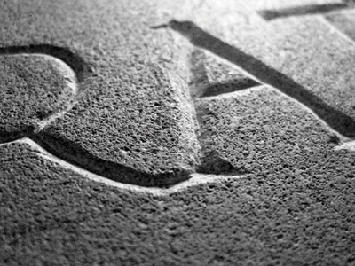 Stone Carving letterform letters pirate stone stone carving type