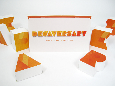 Decaversary 3d direct mail geometric handmade paper type typography