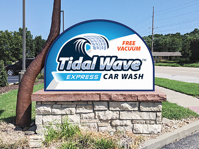 Tidal Wave Express Car Wash logo and monument sign