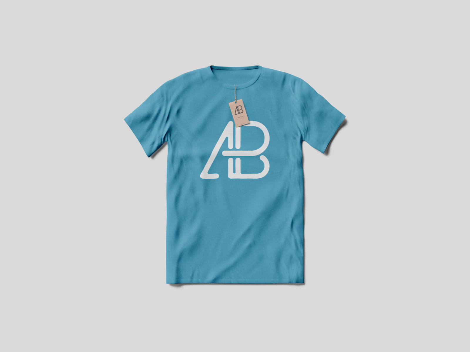 Download T-Shirt With Tag Mockup by Anthony Boyd Graphics on Dribbble