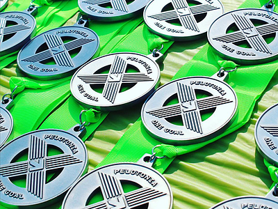 Pelotonia Medals arrow medal x